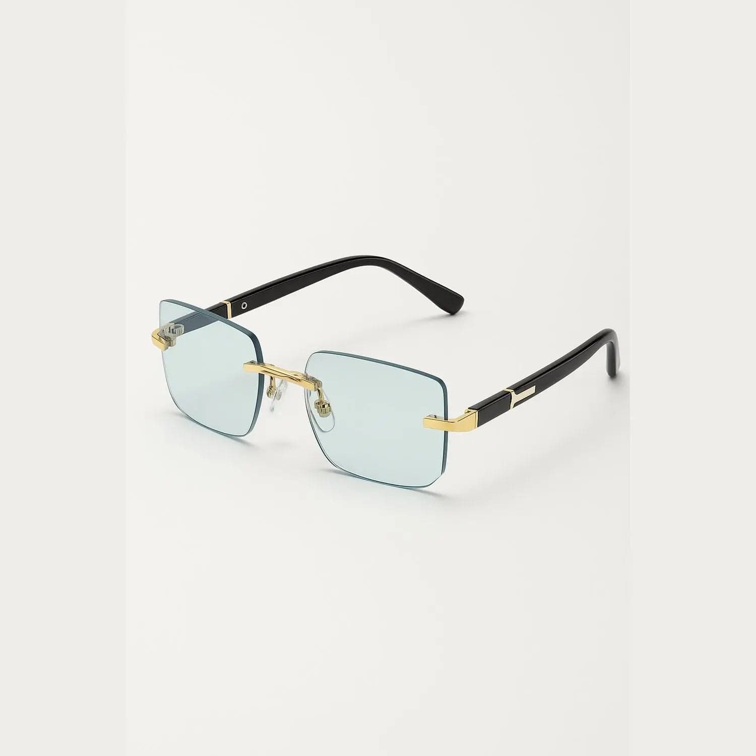 VISQUE AURUM retro square sunglasses with light blue lenses and gold accents, featuring a stylish and modern design.